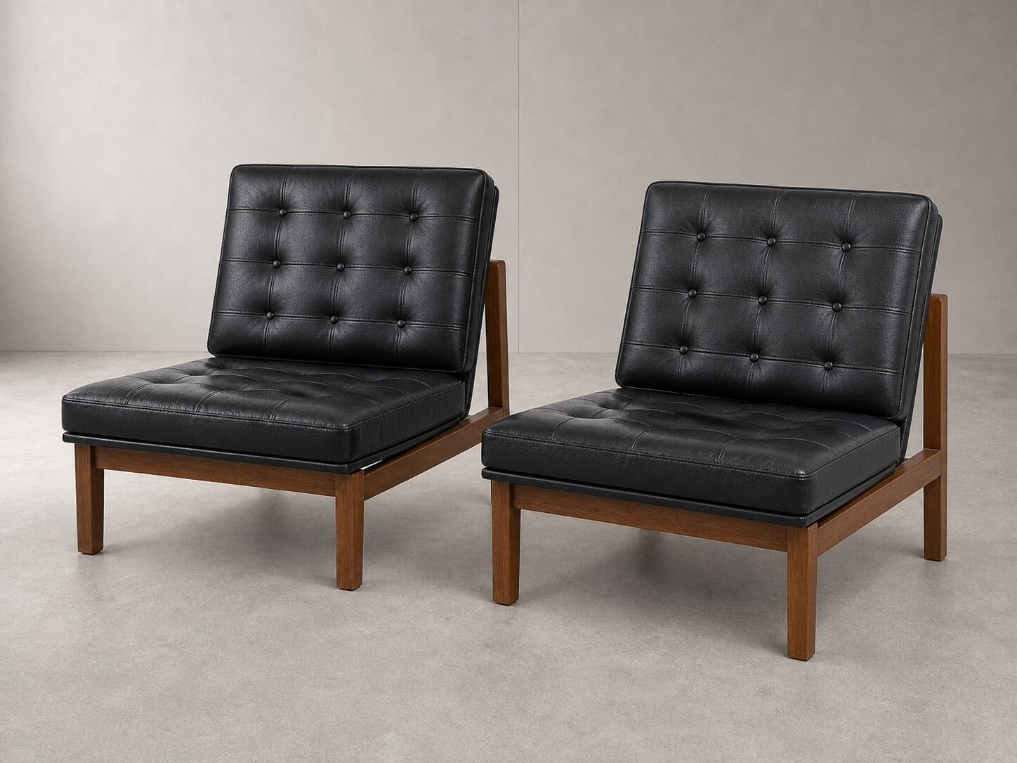 Black Tufted Leather Mid-Century Lounge Chairs — $2,800 new, $1,495 today | Moveabl