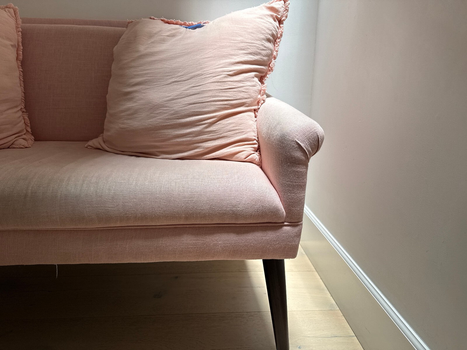 Blush Pink Linen Loveseat with Ruffled Pillows